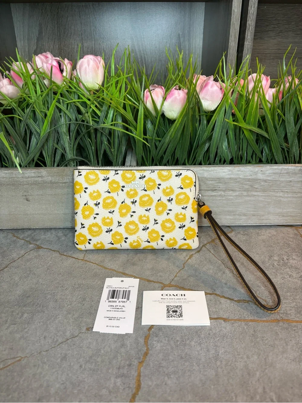 COACH NWT Yellow Floral Wristlet Pouch with Brown Strap